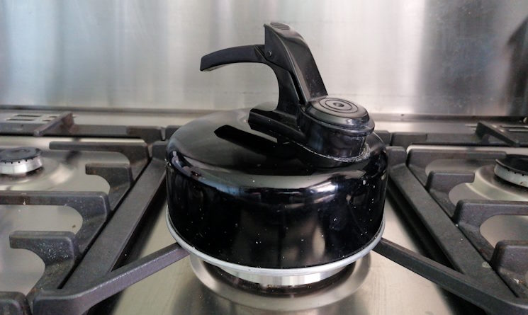 Camping kettle on gas hob