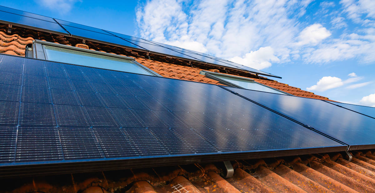 Solar photovoltaic panels installed on a residential roof.